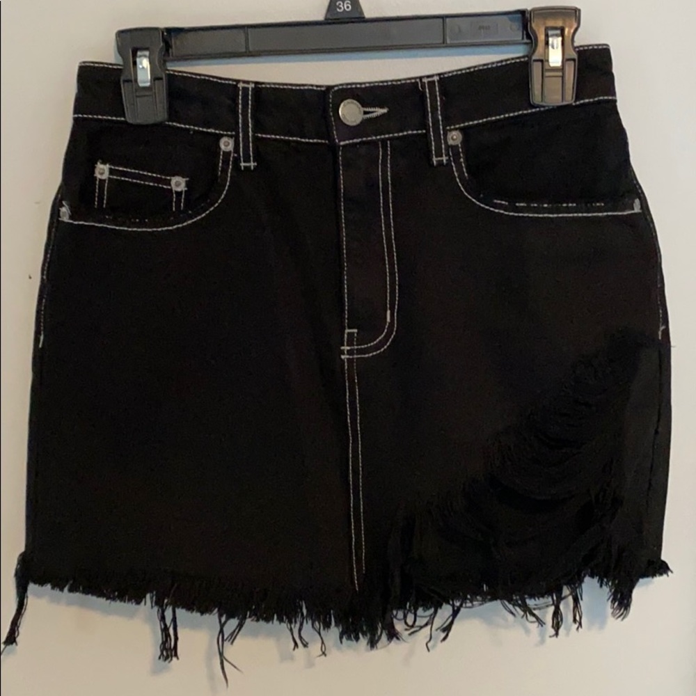 Carmar ripped black jean skirt